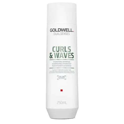 En vit flaska schampo för vågigt hår tillverkad av Goldwell