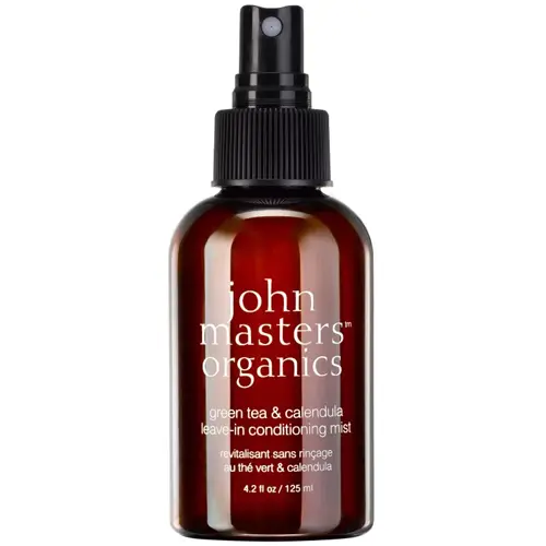 En brun flaska med hårmist tillverkad av John Masters Organics som kallas "leave-in-mist"