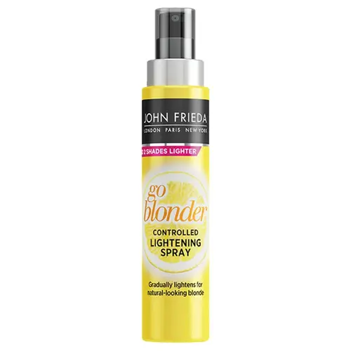 En gul sprayflaska med uppljusningsspray tillverkad av märket "John Frieda" som ljusar upp hårfärgen